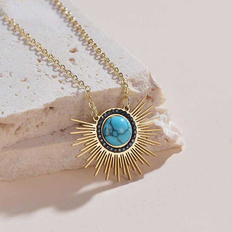 Venta al por mayor Collar colgante de turquesa de girasol de acero de titanio